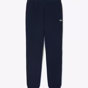 Lacoste - Pantaloni della tuta tapered fit in tessuto felpato